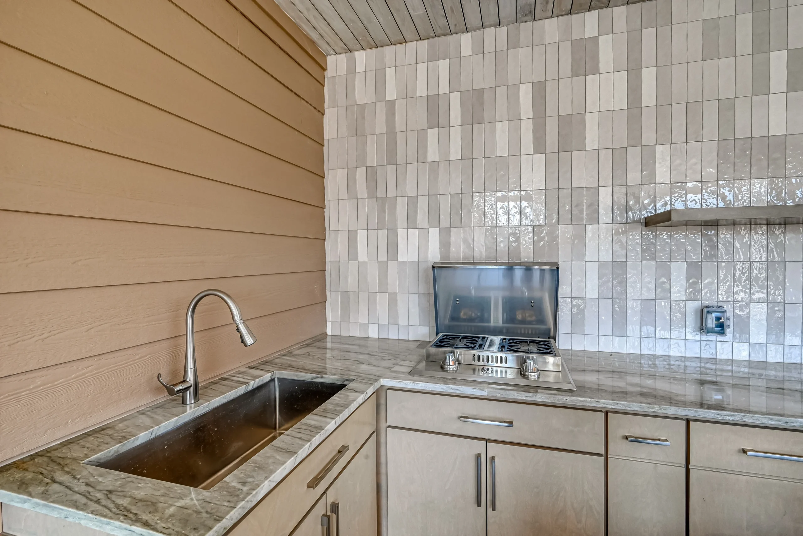 Modern Outdoor Kitchen Outdoor Kitchen Remodel in Houston, TX by SK Houston Constructions project photo
