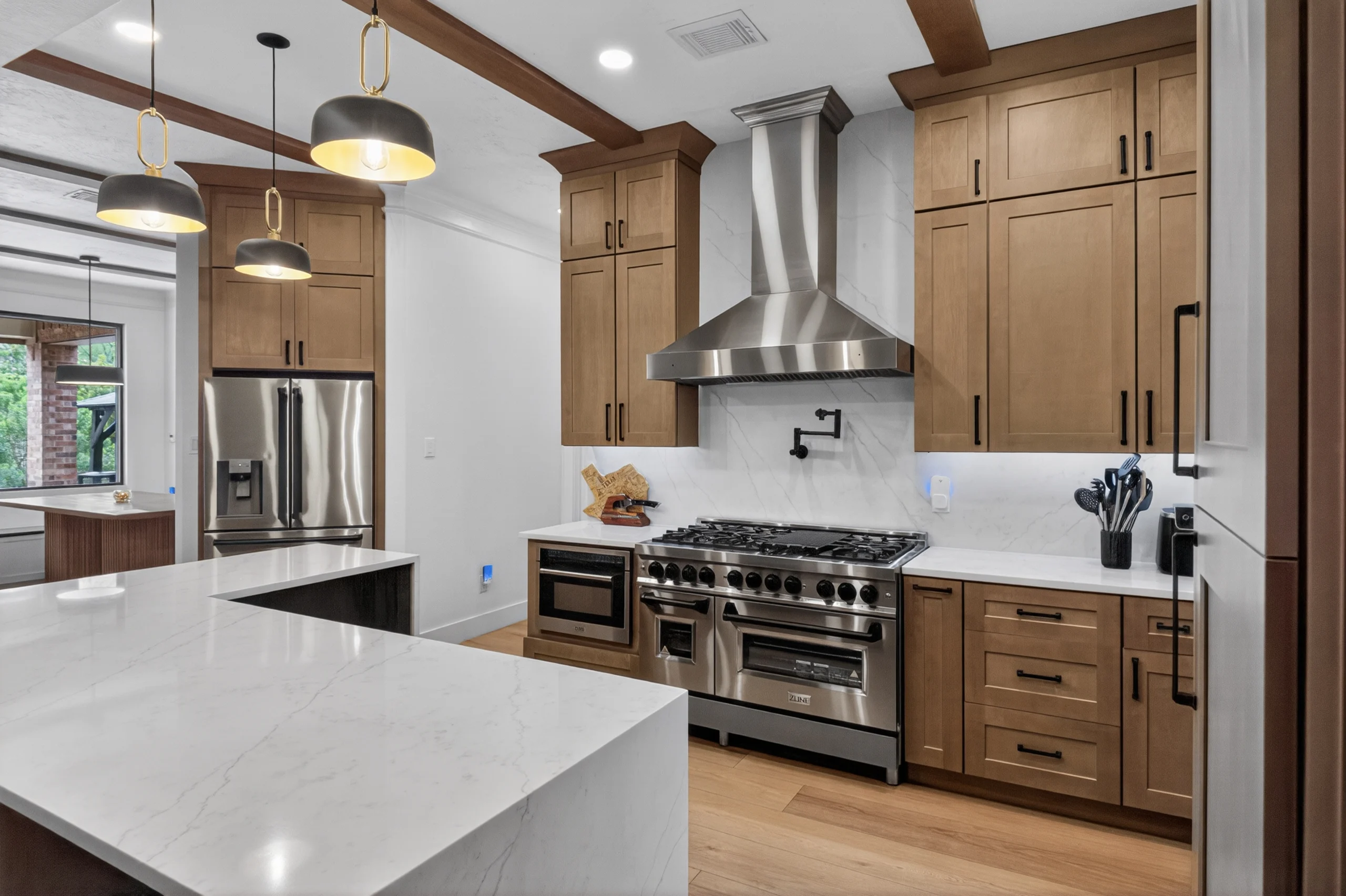 Contemporary Kitchen With Warm Wood Cabinetry Kitchen Remodel in Houston, TX by SK Houston Constructions project photo